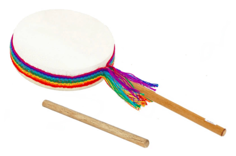 A round, double-sided drum on a stick with a rainbow ribbon around the rim with a stick laying next to it