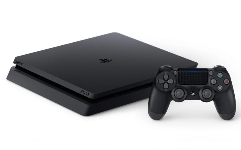 A PlayStation 4 and one of its controllers