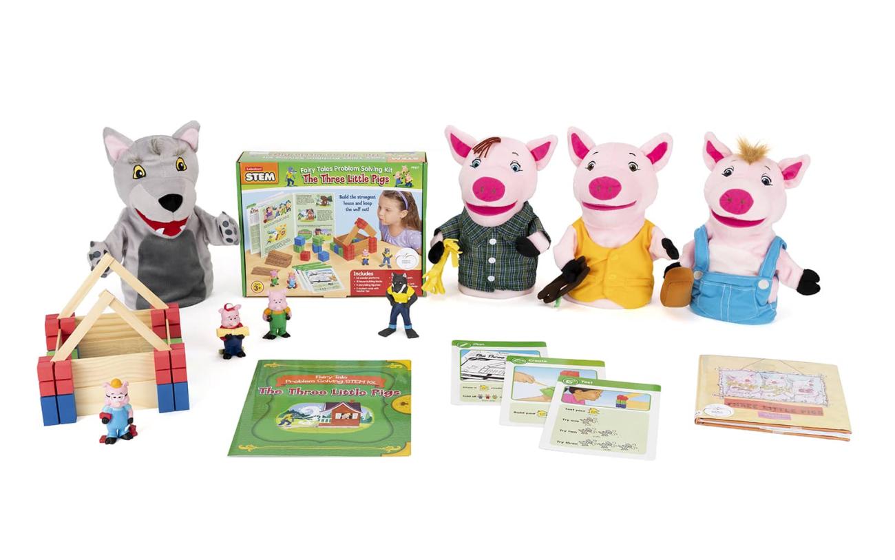 Contents of the Three Little Pigs Early Literacy Kit including a book, Fairy Tales Problem Solving kit, and puppets