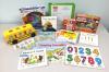 Contents of the All About Numbers Early Literacy Kit including number beanbags, books, and puzzles